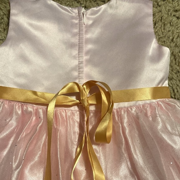 Dorissa sparkle tulle pink dress with a gold tie. - Picture 6 of 7